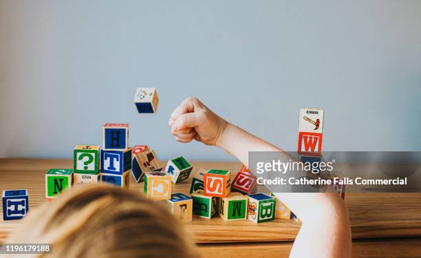 letter blocks - furious child stock pictures, royalty-free photos & images