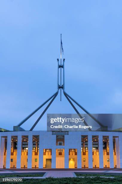 australian parliament house exterior at sunrise. - parliament house canberra stock pictures, royalty-free photos & images