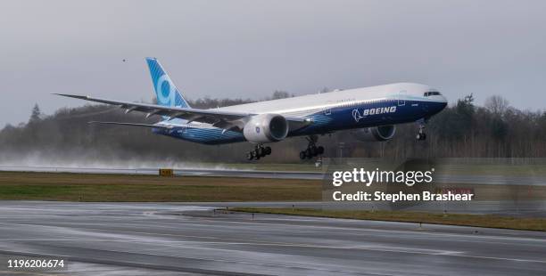 Boeing 777X airliner lifts off for its first flight at Paine Field on January 25, 2020 in Everett, Washington. The plane is the latest iteration of...