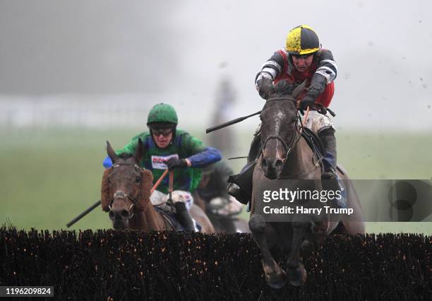 Potters Corner ridden by Jack Tudor jumps the last before going on to win the Coral Welsh Grand National Handicap Chase at Chepstow Racecourse on...