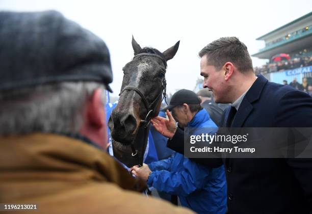 Connections celebrate after winning the Coral Welsh Grand National Handicap Chase with Potters Corner at Chepstow Racecourse on December 27, 2019 in...