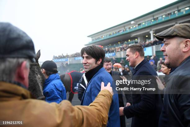 Trainer Christian Williams celebrates after winning the Coral Welsh Grand National Handicap Chase with Potters Corner at Chepstow Racecourse on...