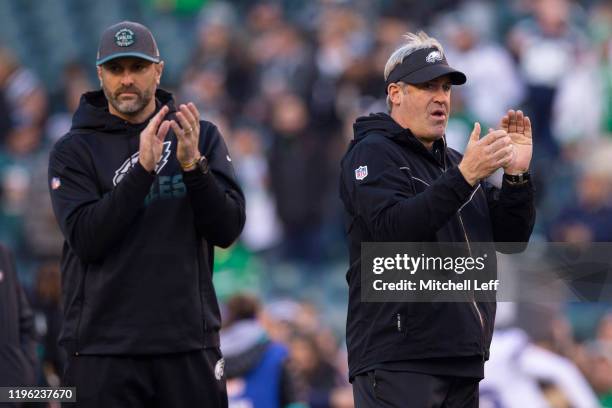 Offensive coordinator Mike Groh and head coach Doug Pederson of the Philadelphia Eagles react prior to the game against the Dallas Cowboys at Lincoln...