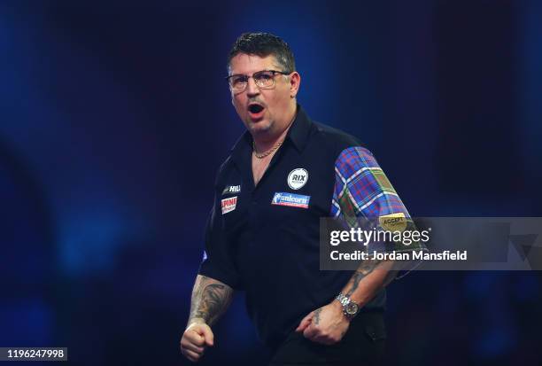 Gary Anderson of Scotland celebrates during his fourth round match against Nathan Aspinall of England on Day 12 of the 2020 William Hill World Darts...