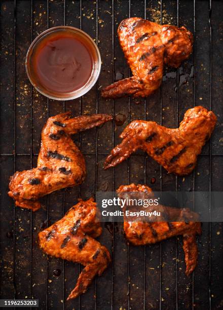 barbecue grilled chicken wings - bbq chicken wings stock pictures, royalty-free photos & images