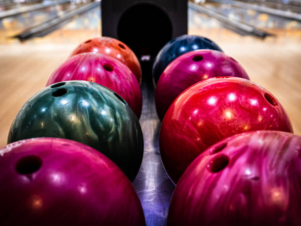 brightly colored bowling balls - bowling stock pictures, royalty-free photos & images