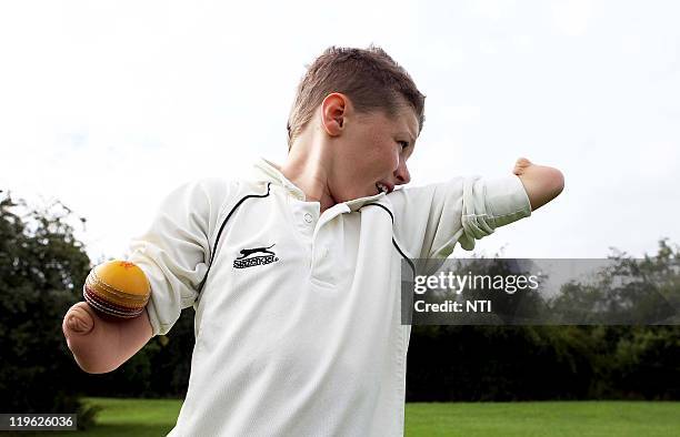 Kearan Tongue-Gibbs, aged 11 poses as he plays cricket on July 22, 2011 in Redditch, England. Kieran is a young cricketing prodigy who is amazing his...