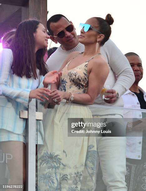 Jennifer Lopez and Alex Rodriguez with Natasha Alexander Rodriguez at the 2020 Pegasus World Cup Championship Invitational Series at David Grutman's...