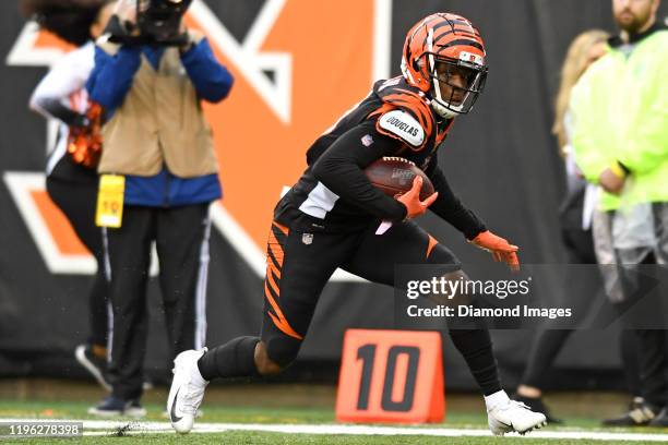 Wide receiver John Ross of the Cincinnati Bengals carries the ball in the third quarter of a game against the Cleveland Browns on December 29, 2019...