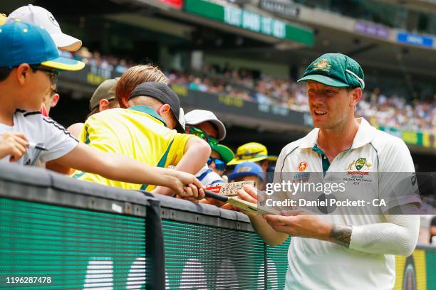 James Pattinson of Australia greets fans during day three of the Second Test match in the series between Australia and New Zealand at Melbourne...