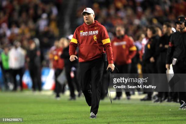 Head coach Clay Helton of the USC Trojans looks on during the second half of the San Diego County Credit Union Holiday Bowl against the Iowa Hawkeyes...
