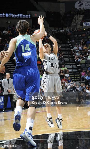 Tully Bevilaqua of the San Antonio Silver Stars shoots the ball against Nicole Powell of the New York Liberty at AT&T Center on July 8, 2011 in San...