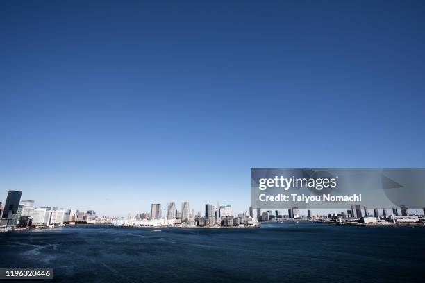 tokyo landscape, tokyo bay and blue sky. - toyosu stock-fotos und bilder