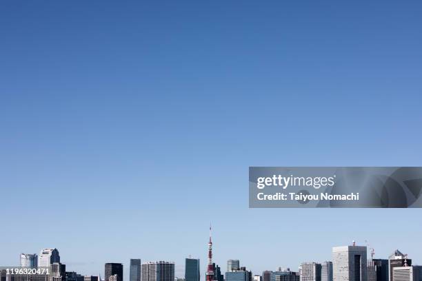 tokyo buildings and blue sky - tokyo financial building stock pictures, royalty-free photos & images