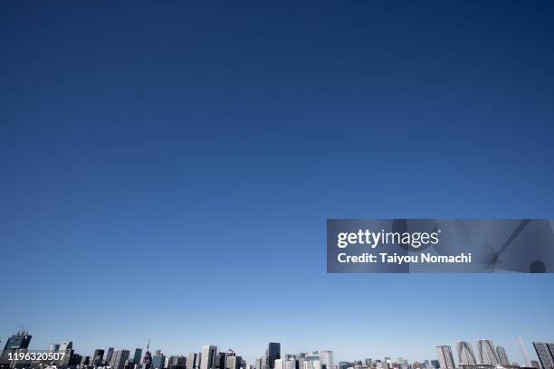 tokyo buildings and blue sky - kachidoki tokyo stock pictures, royalty-free photos & images