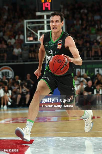Ben Madgen of the Phoenix handles the ball during the round 13 NBL match between the South East Melbourne Phoenix and the Illawarra Hawks at...