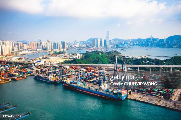 commercial logistics industry. the containers is loaded / unloaded at kwai tsing container terminals of hong kong - global trade war stock pictures, royalty-free photos & images