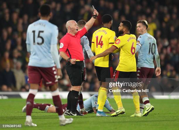 Adrian Mariappa of Watford is shown a red card by referee Simon Hooper during the Premier League match between Watford FC and Aston Villa at Vicarage...