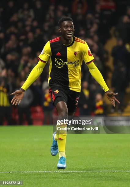 Ismaila Sarr of Watford celebrates after scoring his sides third goal during the Premier League match between Watford FC and Aston Villa at Vicarage...