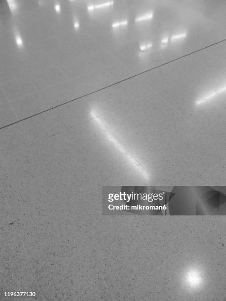 personal view of tiled floor - hochglanz stock-fotos und bilder