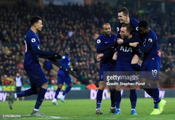 Christian Eriksen of Tottenham Hotspur celebrates with teammates Lucas Moura, Giovani Lo Celso, Ryan Sessegnon and Dele Alli of Tottenham Hotspur...
