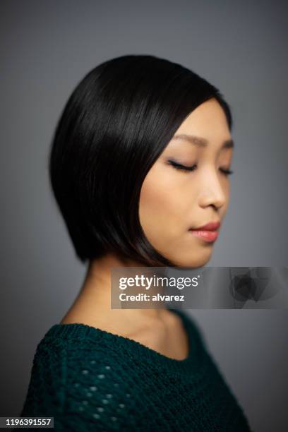 beautiful asian woman with short hair - asian woman short hair stock pictures, royalty-free photos & images