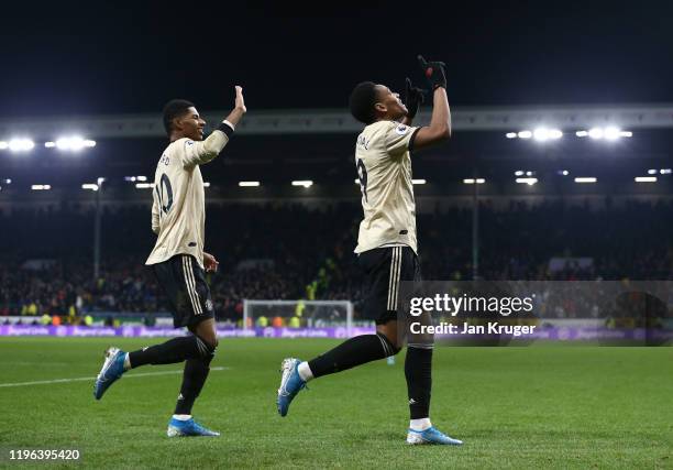 Anthony Martial of Manchester United celebrates with teammate Marcus Rashford after scoring his teams first goal during the Premier League match...