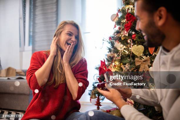 christmas proposal - wedding jewellery stock pictures, royalty-free photos & images