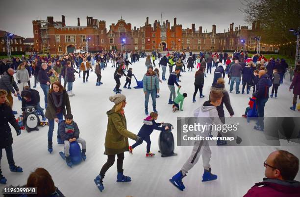 london christmas holiday skaters - hampton court palace stock pictures, royalty-free photos & images