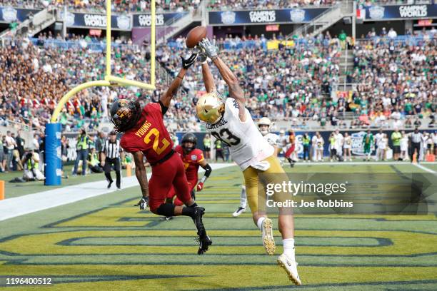 Datrone Young of the Iowa State Cyclones defends a pass in the end zone against Chase Claypool of the Notre Dame Fighting Irish in the second half of...