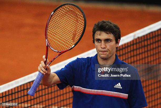 Gilles Simon of France celebrates after winning his semi final match against Mikhail Youzhny of Russia during the bet-at-home German Open Tennis...