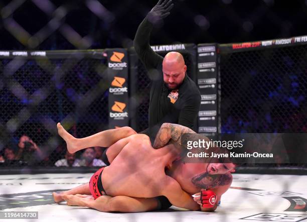 Referee Frank Trigg stops the fight as Sergio Pettis defeats Alfred Khashakyan in their bantamweight fight at The Forum on January 25, 2020 in...