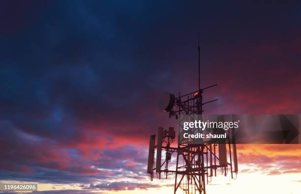 cellular tower - funken stock-fotos und bilder