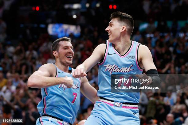 Tyler Herro of the Miami Heat celebrates with Goran Dragic after making a three pointer with 6.9 seconds remaining in regulation against the...