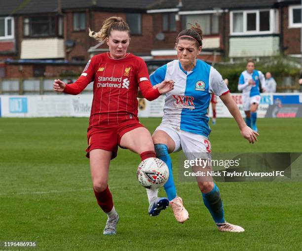 Melissa Lawley of Liverpool and Chelsey Jukes of Blackburn Rovers in action at The Sir Tom Finney Stadium during the Womens FA Cup game on January...