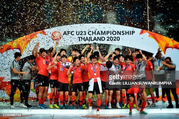 South Korean players celebrate winning the AFC U-23 Championship final football match between Saudi Arabia and South Korea at Rajamangala Stadium in...