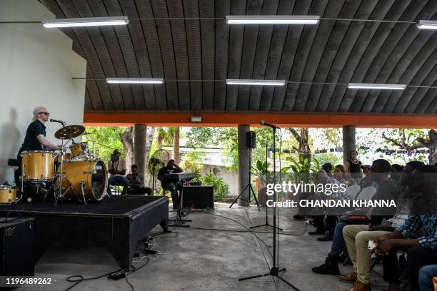 Israeli musician Yogev Shetrit conducts a music workshop during the Port au Prince International Jazz Festival PAPJAZZ in Port-au-Prince, on January...