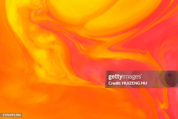 red and yellow acrylic background. - red liquid stock pictures, royalty-free photos & images