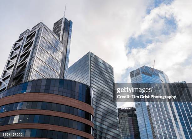 directly below shot of modern skyscrapers in the city of london's financial district. london. uk - salesforce tower london stock pictures, royalty-free photos & images