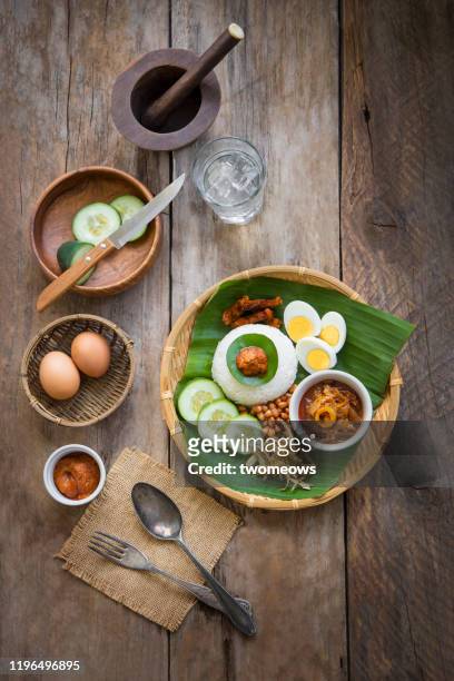 malaysian food 'nasi lemak'. - traditional malay food stock pictures, royalty-free photos & images
