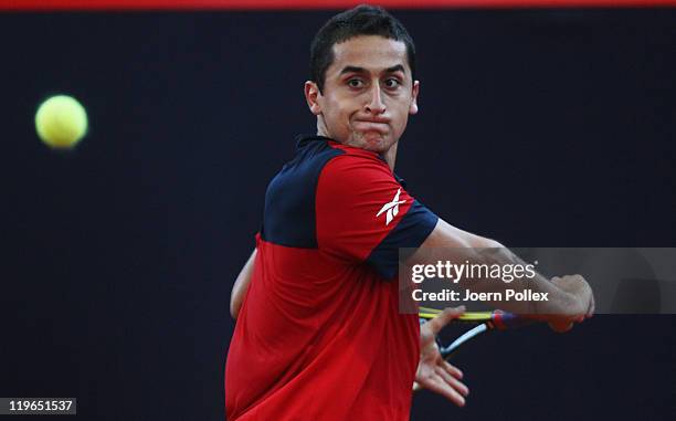 Nicolas Almagro of Spain returns a backhand during his semi final match against Fernando Verdasco of Spain during the bet-at-home German Open Tennis...