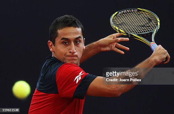 Nicolas Almagro of Spain returns a backhand during his semi final match against Fernando Verdasco of Spain during the bet-at-home German Open Tennis...