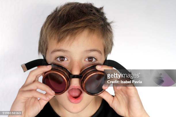 shocked boy looking through aviator glasses - opening head silhouette stock pictures, royalty-free photos & images