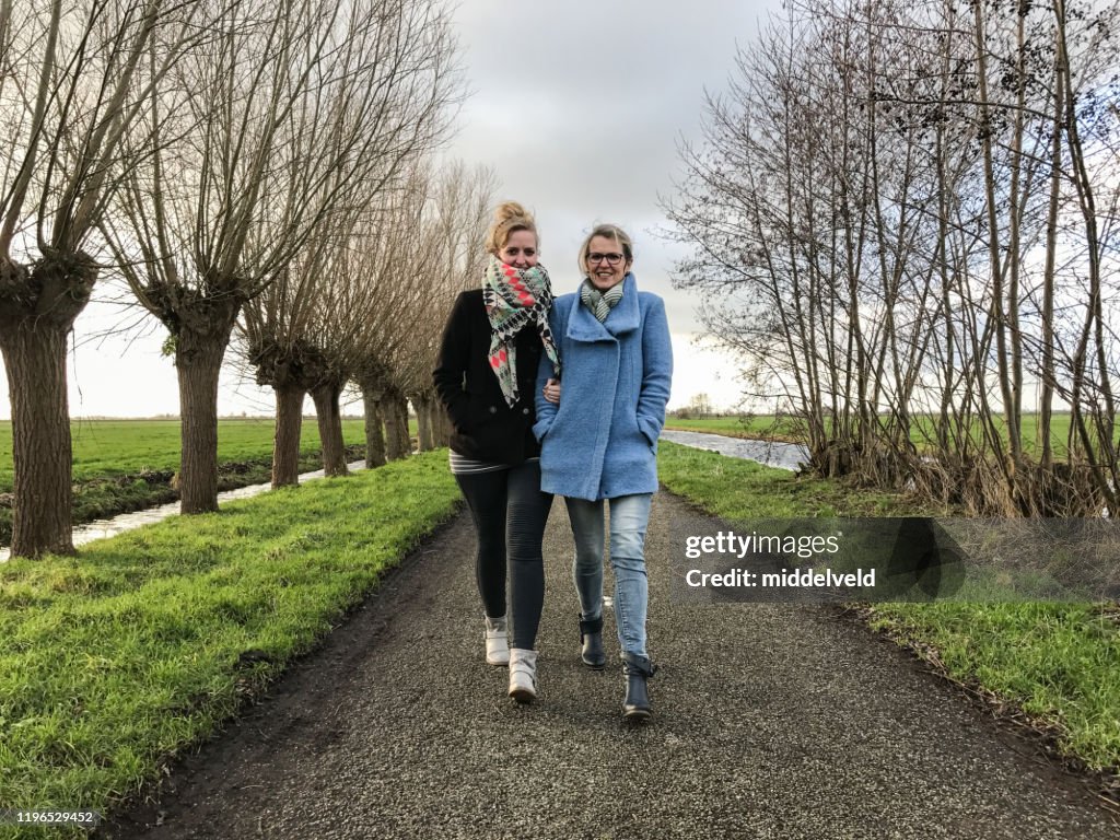 Mother and daughter having a walk