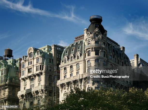 a majestic apartment building built between 1899 and 1904 in broadway at the intersection with amsterdam avenue in the upper west side of manhattan, new york city - broadway manhattan stock pictures, royalty-free photos & images