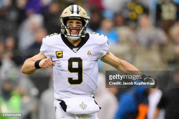 Drew Brees of the New Orleans Saints reacts after a touchdown pass during the third quarter during their game against the Carolina Panthers at Bank...