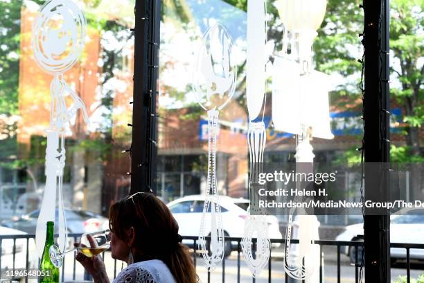 Large windows have cutlery motifs outside at Spuntino Restaurant on June 27, 2019 in Denver, Colorado. Spuntino Restaurant is located at 2639 W 32nd...