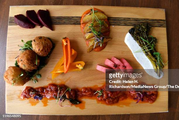 The Verdure, a selection of prepared seasonal vegetables and pickles, at Spuntino Restaurant on June 27, 2019 in Denver, Colorado. The Antipasti dish...