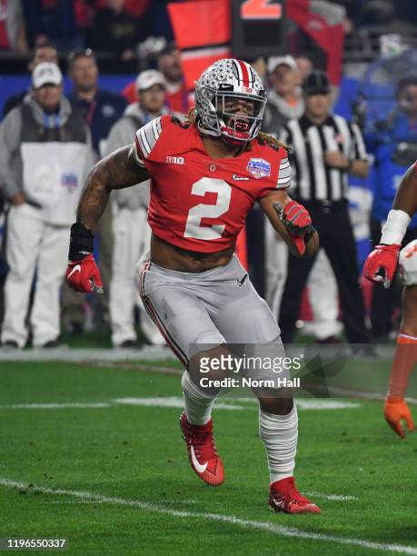 Chase Young of the Ohio State Buckeyes rushes up field against the Clemson Tigers during the Playstation Fiesta Bowl at State Farm Stadium on...