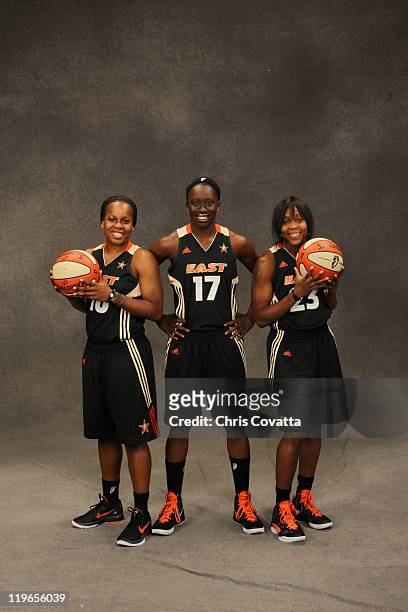 Epiphanny Prince, Essence Carson and Cappie Pondexter of the Eastern Conference All-Stars poses for a team photo at AT&T Center on July 23, 2011 in...